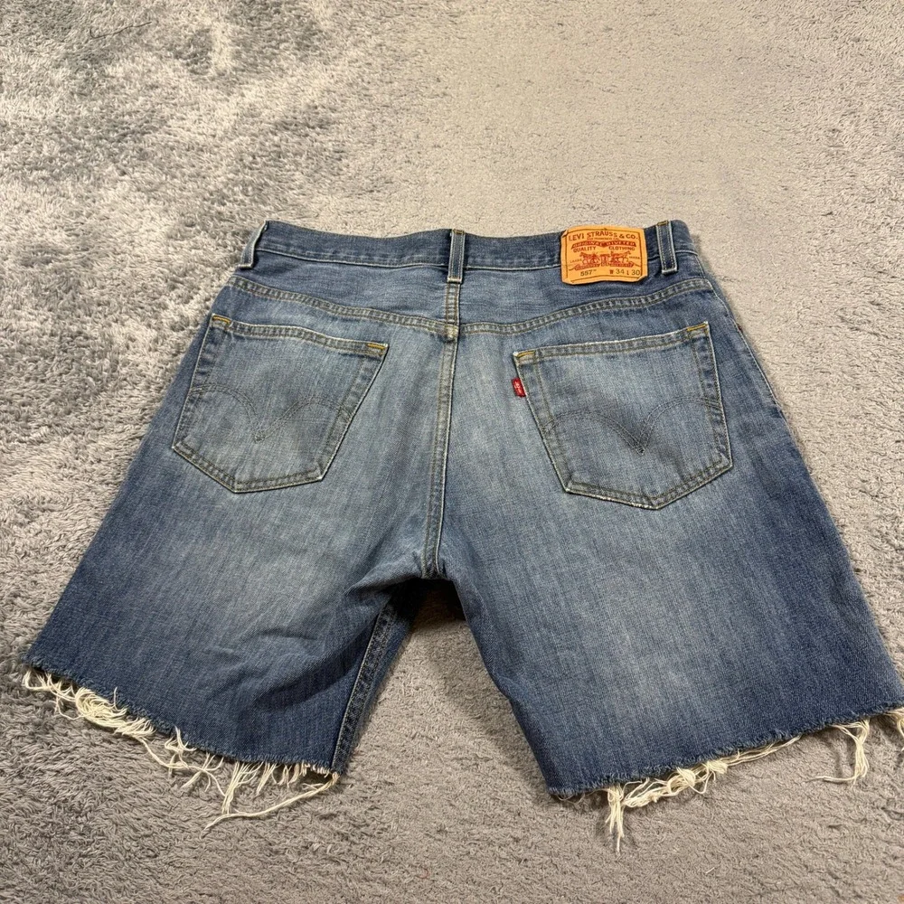Levis Mens 557 Relaxed Boot Cut Off Denim Shorts W34 Blue Raw Hem Cotton